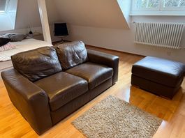 Älteres Ledersofa Ikea plus Hocker, dunkelbraun