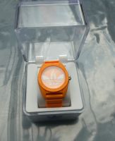 Montre Adidas orange unisexe,  neuf