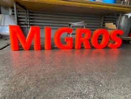 Leuchtschrift MIGROS