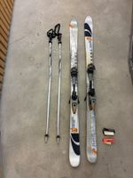 Salomon-Twin-Tip-Skis und Stöcke