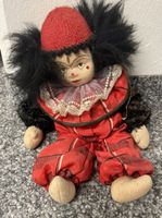  Clown Puppe rot schwarz Muster geschützt