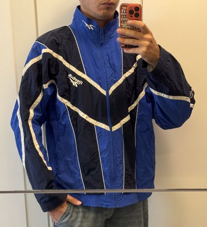 Veste de sport Reebok bleue marine taille L bon état