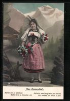 Emmenthalerin in Tracht vor Bergkulisse