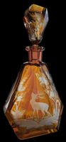 Caraffa Decanter in Cristallo di Boemia ambrato intagliato.