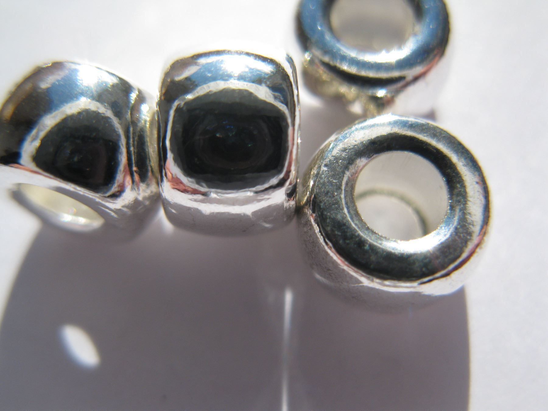 Perle (finte): 12 Metallperlen versilbert 8x5mm – Nuovo e nell'imballaggio originale da St. Margarethen TG venduto da LuanaKa 1
