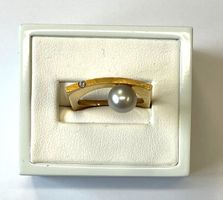 Moderner Damenring mit Perle 18Karat GG