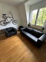 Ledersofa und Sessel schwarz gebrauchter Zustand