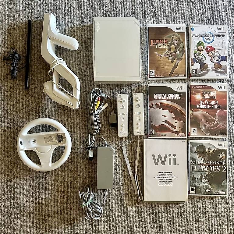 Consoles: Nintendo Wii complète + 5 jeux + accessoires – D'occasion à Epalinges par mr.siegal 2