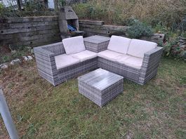 Rattanlounge mit Kissenbox für den Garten