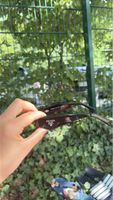 Lunettes de soleil Prada Milano femme noir bon état