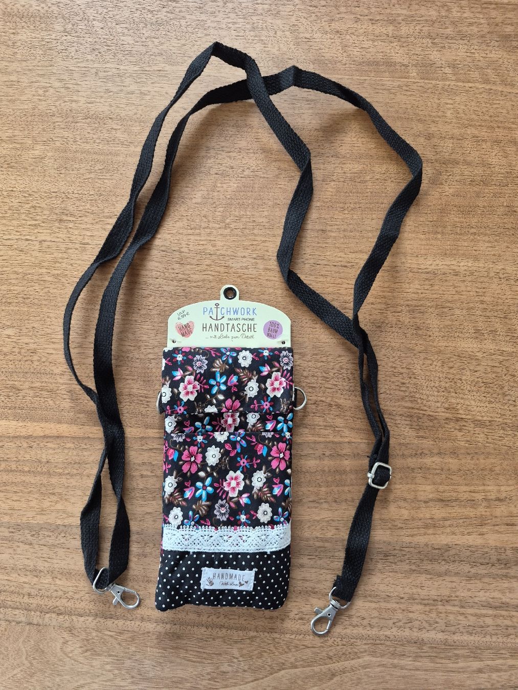 Borse da donna: Patchwork Smart-Phone Tasche mit Trageriemen floral schwarz  – Nuovo e nell'imballaggio originale da Olten venduto da bayoffires