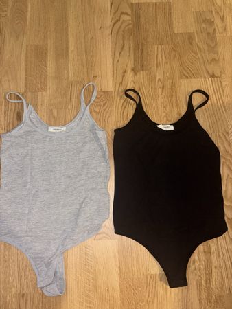 2 Bodysuits Zalando schwarz und grau