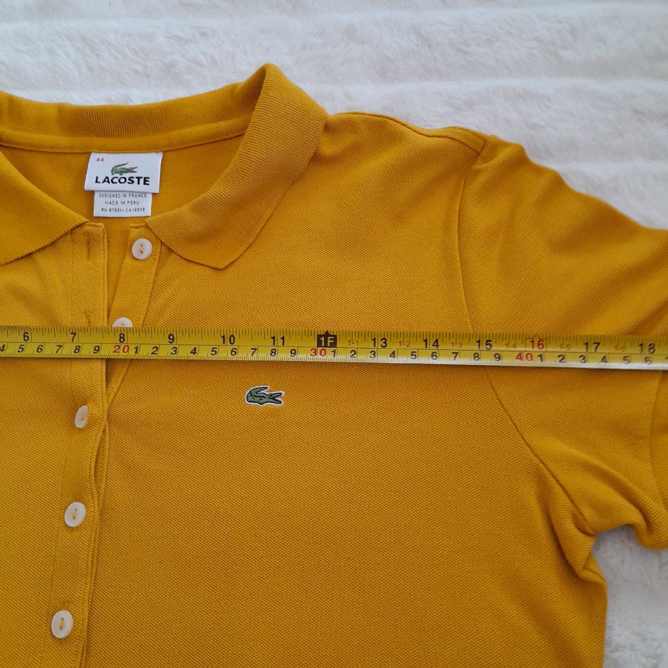 Lacoste Magliette Polo: Polo Lacoste jaune moutarde, taille 44, – Usato da Renens VD venduto da ser_j2fn 1