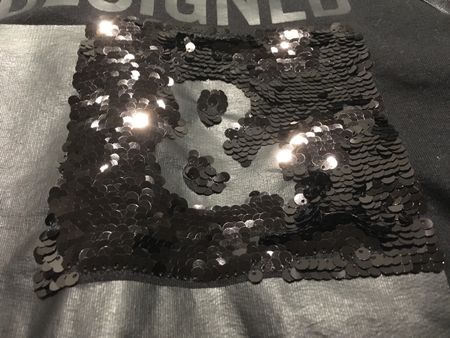 Cartoon Pullover schwarz mit Pailletten Grösse S