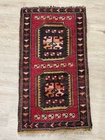 Orientteppich aus Wolle mit geometrischem Muster