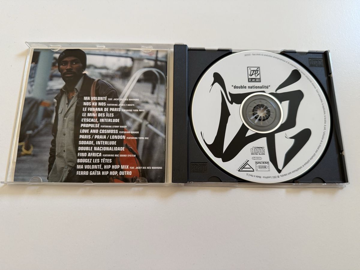 CDs: CD IZE "Double Nationalité"  – D'occasion à Oberried Brienz par Chyara 2