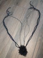 Collier fantaisie noir avec fleur en tissu
