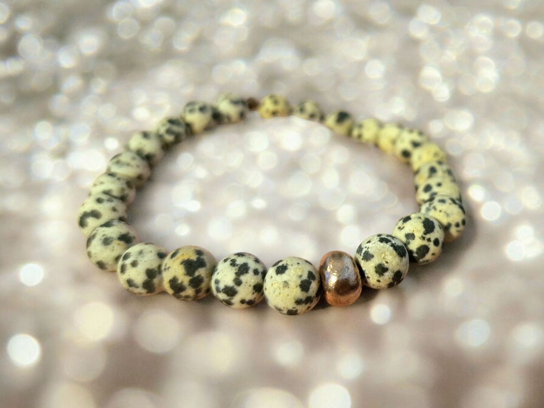 Bracciali & Braccialetti: Armband Dalmatiner-Jaspis & Kupferperle – Nuovo e nell'imballaggio originale da Aarau venduto da Schmuckhoehle_MD 2