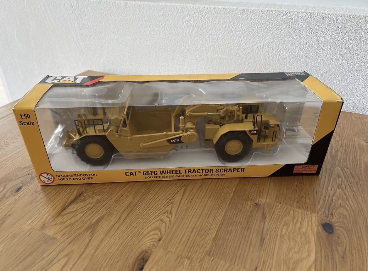 Modellini d'auto: CAT 657G Schürfzug – Nuovo e nell'imballaggio originale da Tumegl/Tomils venduto da tbottoni
