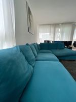 Ecksofa petrolfarben mit Hocker gebraucht in gutem Zustand