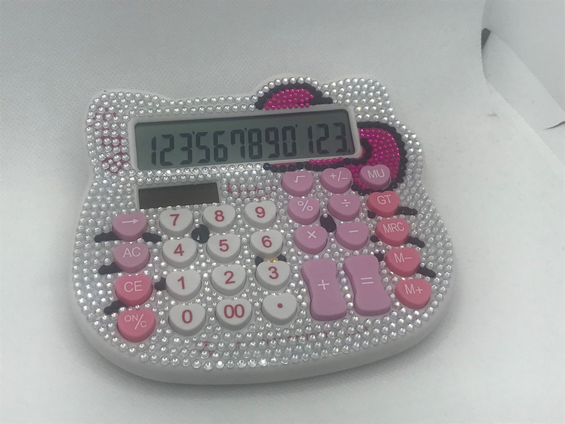 Calcolatrici tascabili: Hello Kitty Rechner, pink, Glitzersteine, neu – Nuovo e nell'imballaggio originale da Niederteufen venduto da mix18 4