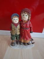 Deko Figur Kinder mit Schlitten Wintermotiv 