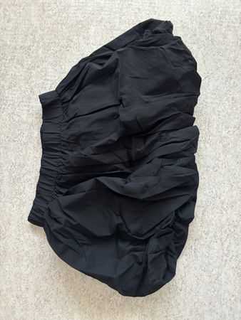 Rock kurz schwarz Grösse L Raffung guter Zustand