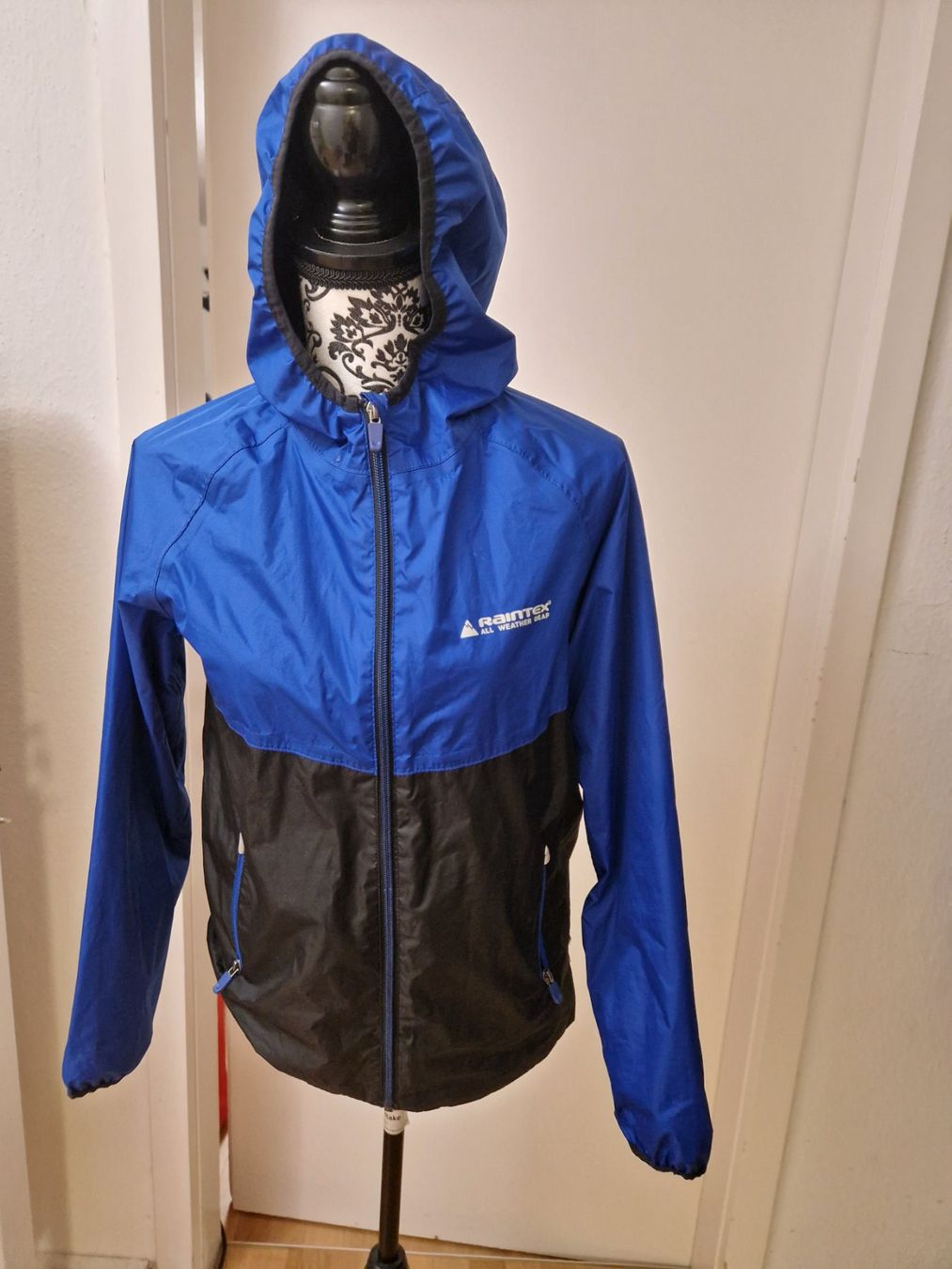 Jacken & Mäntel: Regenjacke Raintex blau/schwarz Grösse 164 – Gebraucht aus Glattbrugg von mas_75t2