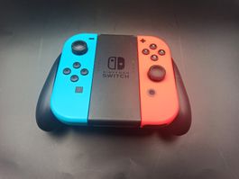 Original Nintendo Switch Joy-Con Set (Neon-Rot/Blau) + Grip