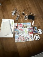 Nintendo Wii Konsole mit Wii Fit Plus und viel Zubehoer