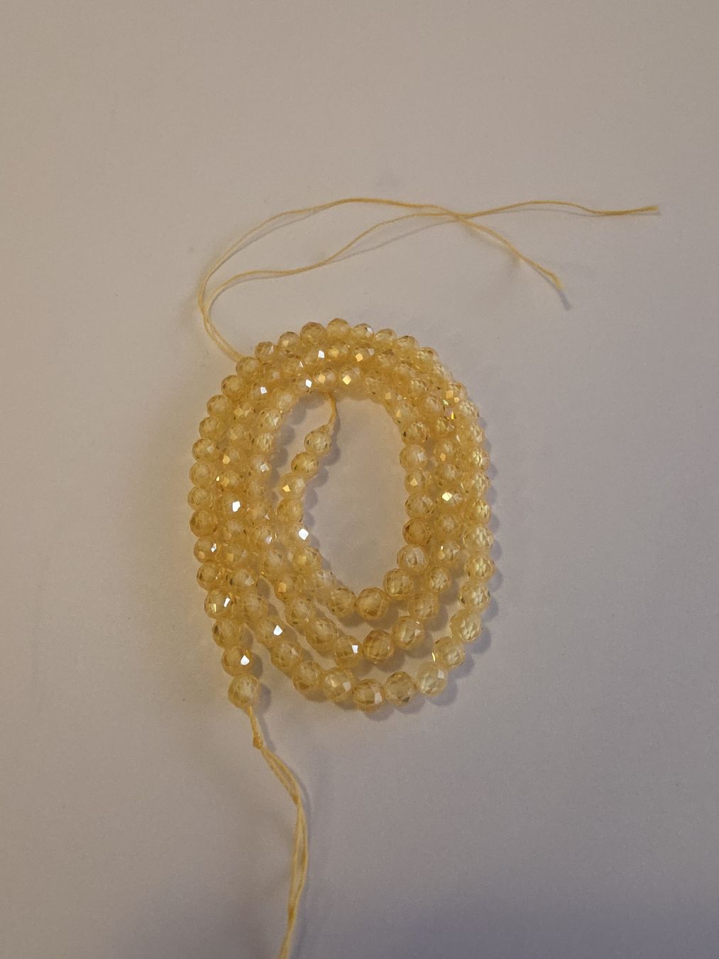 Minerali & Pietre curative: Zirkon Gelb facettiert 4mm. Strang – Nuovo e nell'imballaggio originale da Menziken venduto da Mirager 3