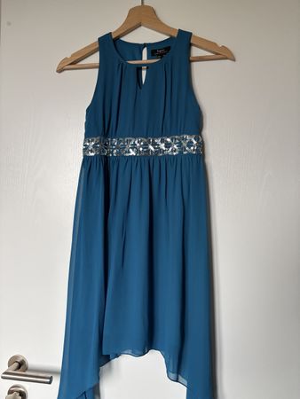 Mädchenkleid blau mit Pailletten Gr.134