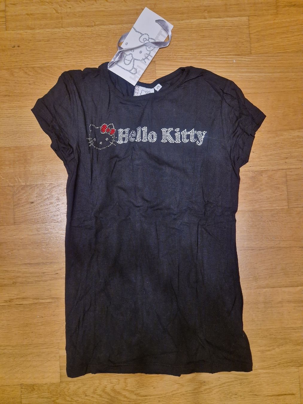 Camicette, T-shirt & Top: T-shirt Hello Kitty strass neuf taille xs – Nuovo e nell'imballaggio originale da Penthaz venduto da Sosotroc