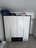 Kleiderschrank schwarz weiss mit Schubladen gebraucht
