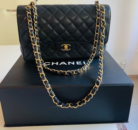 Jumbo double flap Chanel cuir caviar doré excellent état