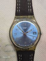 Schweizer Swatch-Uhr mit blauem Zifferblatt und gebrauchtem