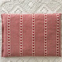 Chriesisteikissen - Elsass rot - weiss.  Inhalt  1 kg