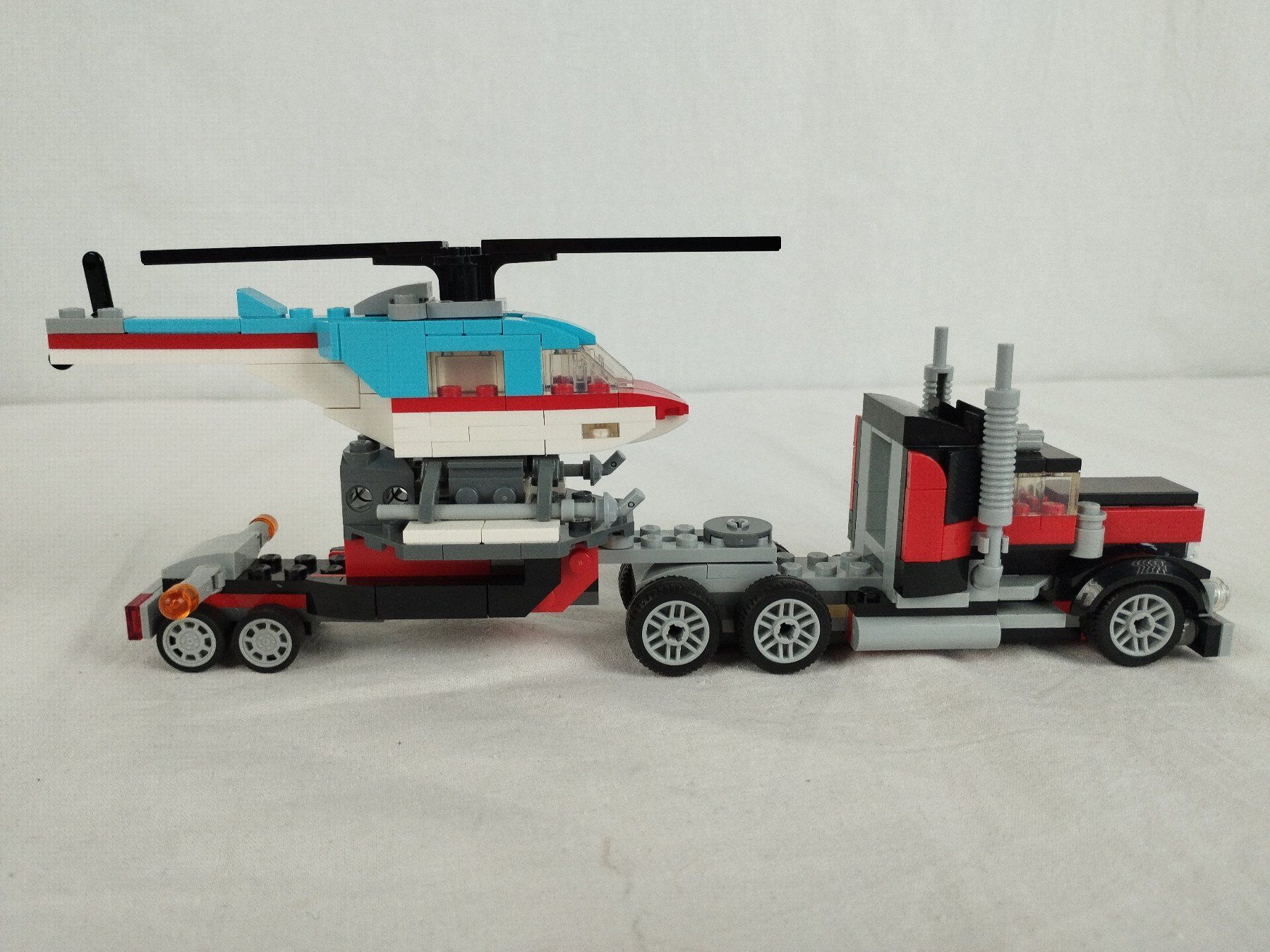 Lego Jeux de construction: LEGO Creator 31146 Tieflader mit Hubschrauber – D'occasion à Schübelbach par Restwert_Schubelbach 6