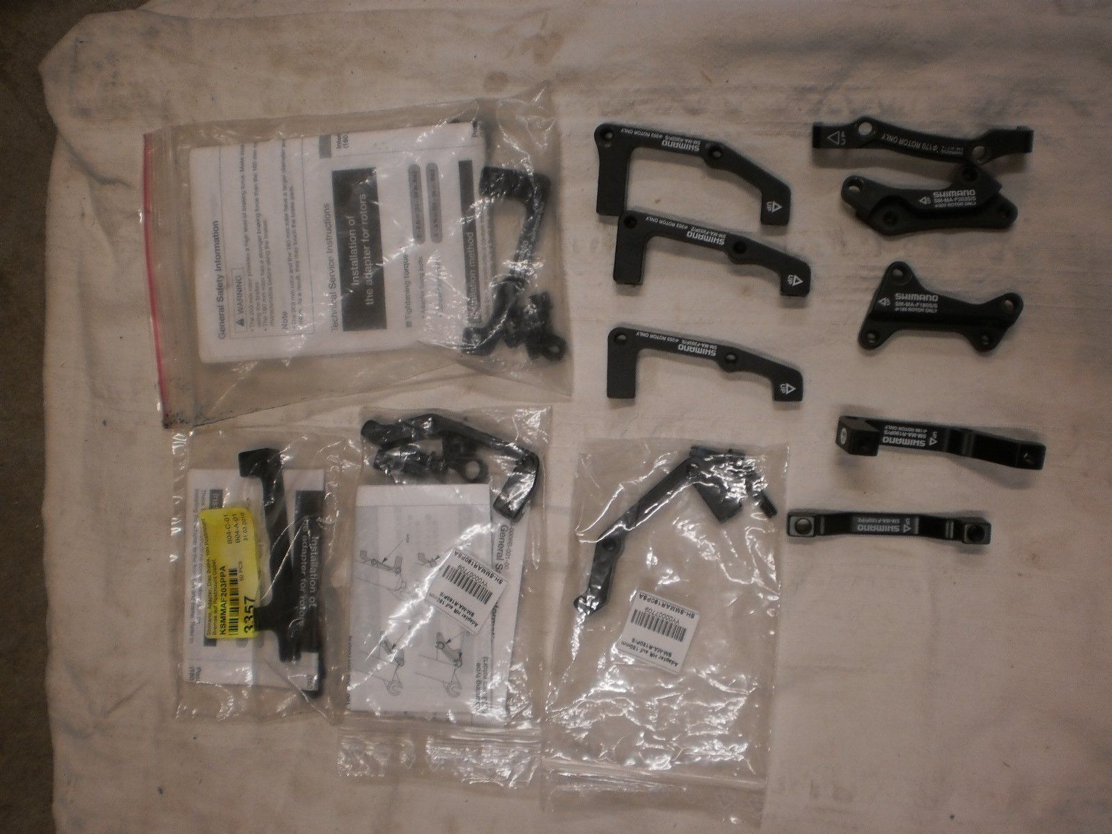 Shimano Pezzi di ricambio: Diverse Shimano Bremsadapter – Usato da Gonten venduto da Bollyalb