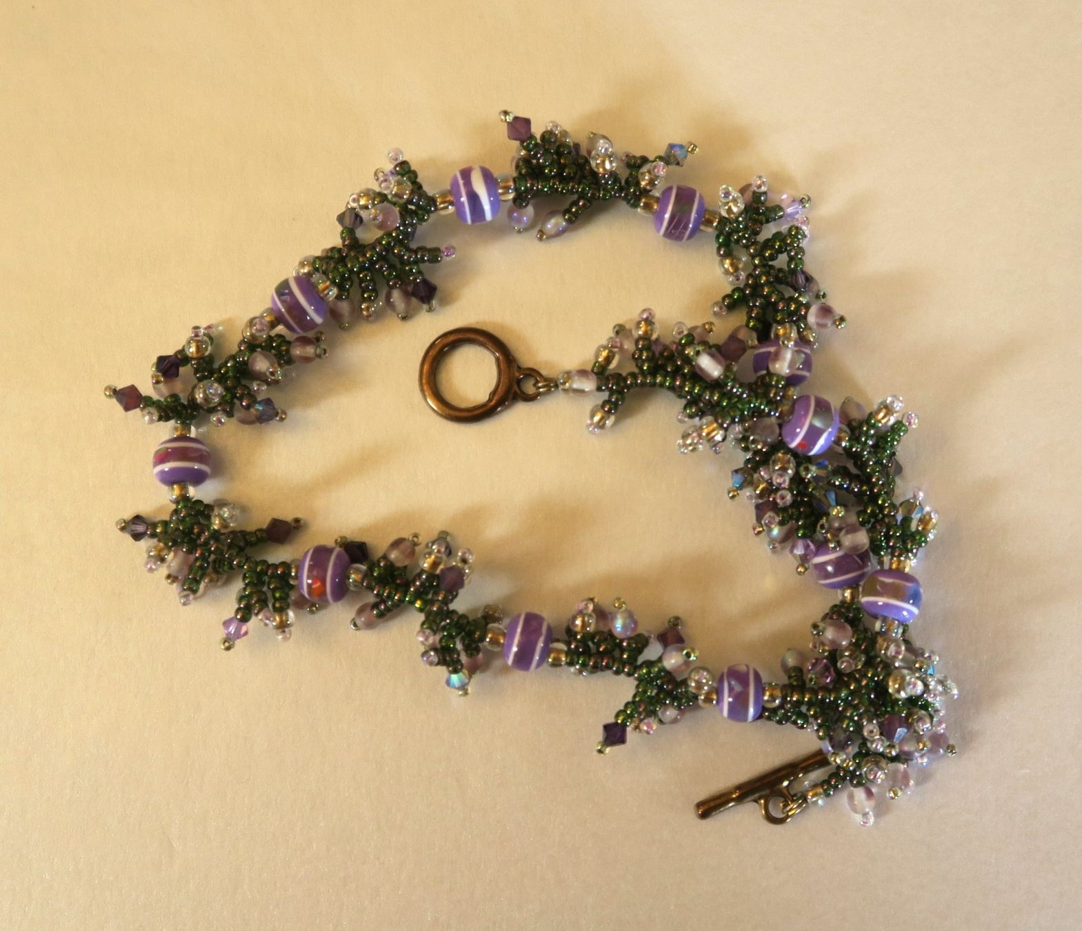 Catenine: Kette Glasperlen violett/grün – Usato da Brittnau venduto da marlenestone 1