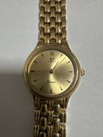 Montre URECH dorée Quartz modèle DC-5055 occasion
