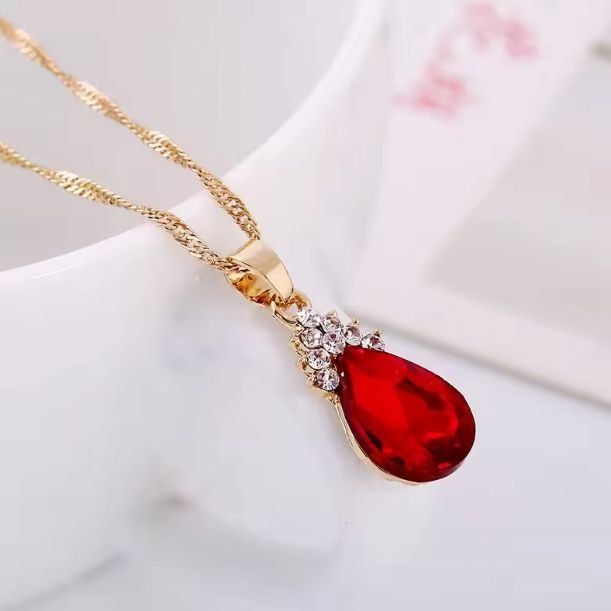 Altri gioielli: Modeschmuck-Set in Goldfarbe mit rotem Stein – Nuovo (secondo la descrizione) da Grenchen venduto da dar_6d52 1