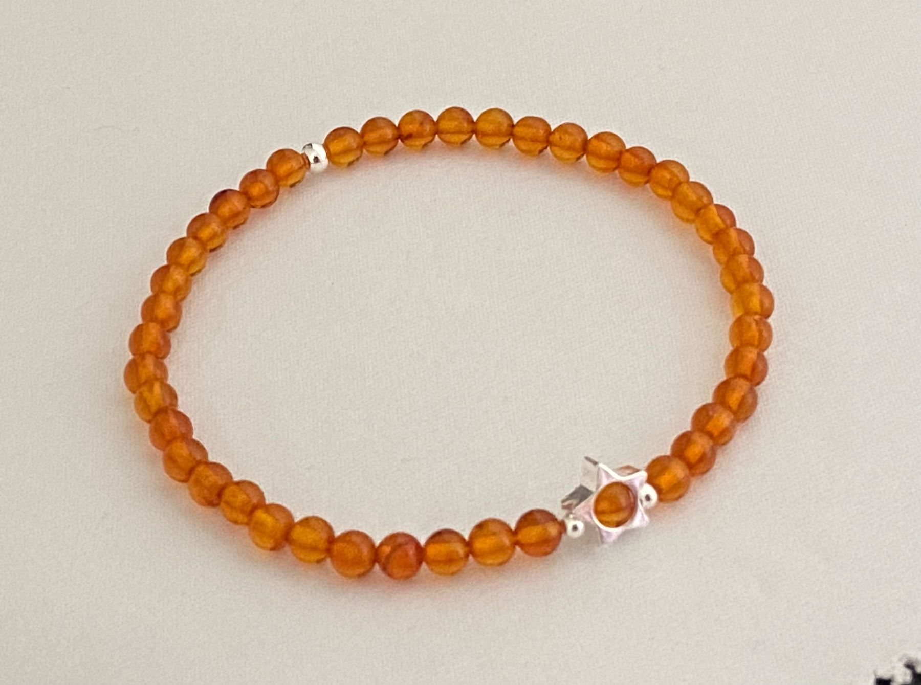 Bracciali & Braccialetti: Edelstein Armband Bernstein mit Silber auf Mass – Nuovo e nell'imballaggio originale da Zuzwil SG venduto da Lemliskat 1