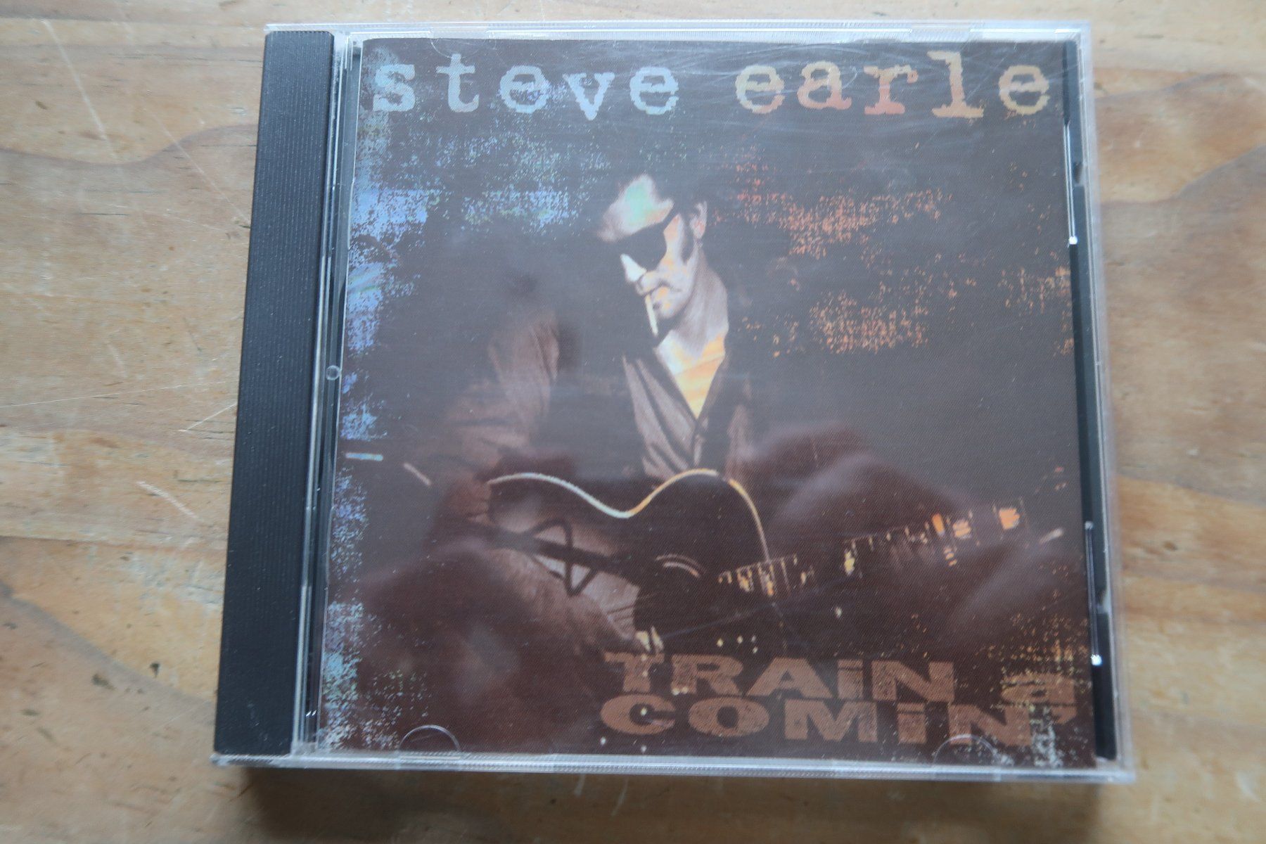 CD: STEVE EARLE - TRAIN A COMIN' - CD – Usato da Basel venduto da Patiscat