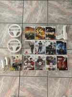 Wii Spiele Konvolut mit Lenkrädern und Controller