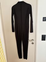 Schwarzer Rippstrick Jumpsuit, langarm, Grösse L