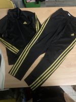 Adidas Trainingsanzug schwarz/gold Gr. 140 wie neu!