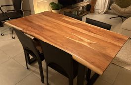 Solid wood top dining table with steel black legs 
