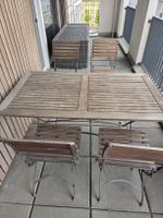 Gartentisch aus Holz mit vier Stühlen gebraucht