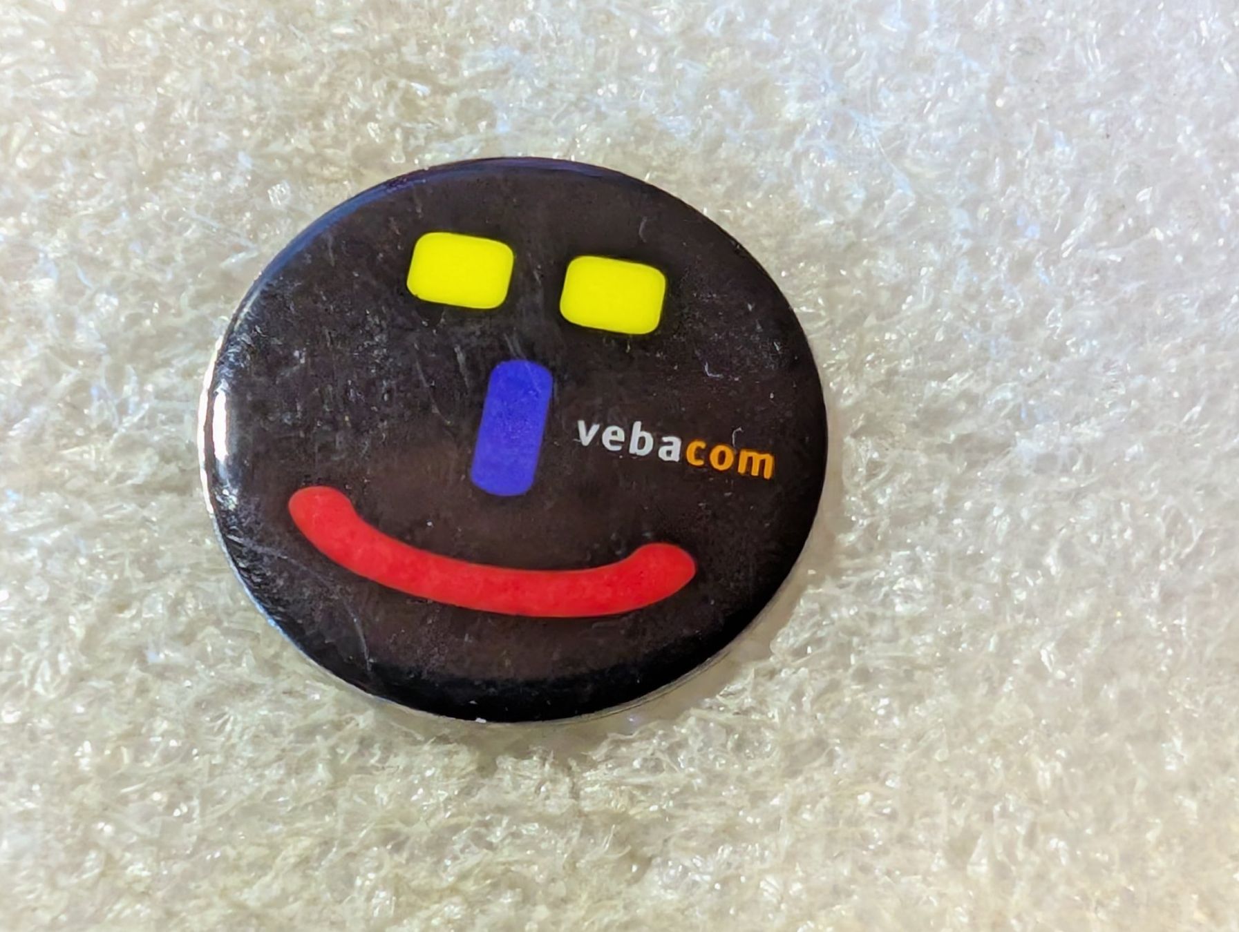 Placchette & Badge: Ansteckpin 229: Vebacom – Usato da Oppligen venduto da Pin-Fall-Shop
